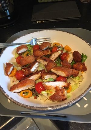 A picture of Healthy simple panko baked chicken salad.