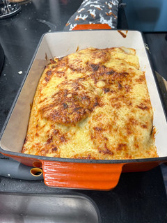 Una foto de Berenjenas a la crema con jamón y gambas