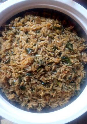 A picture of Jollofrice with zogale.