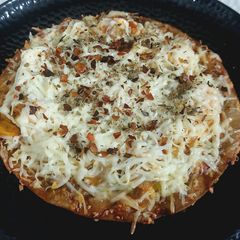 A picture of ROTI PIZZA from LEFTOVER VEGETABLE JALFREZI.