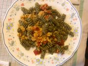 Una foto di pasta e ortica