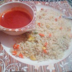 Egg fried rice with Red sauce A picture of Egg fried rice with Red sauce.