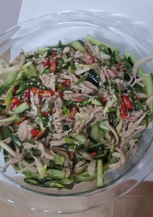 A picture of Chicken salad with mint and toasted sesame seeds.