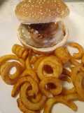 Burger with scamorza, pancetta and caramelised onions