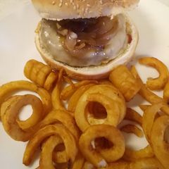 A picture of Burger with scamorza, pancetta and caramelised onions.