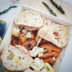 A picture of Roast cauliflower and sweet potatoes.