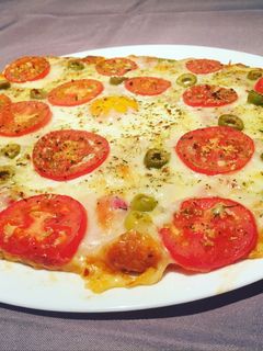 Una foto de Pizza