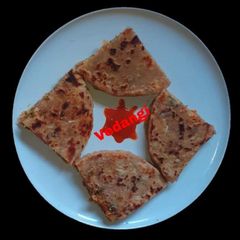 A picture of Cabbage Oats Stuffed Paratha.