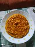 Arroz meloso con restos de pollo asado y salchichas