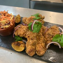 A picture of Southern Fried Chicken with Texas slaw.