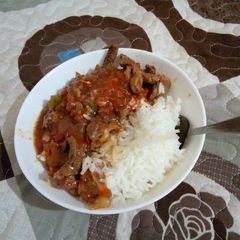 A picture of Fried wet Beef with rice.