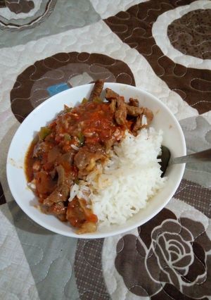 A picture of Fried wet Beef with rice.