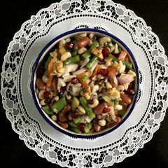 A picture of Zesty Three-Bean Salad with Walnuts and Pomegranates.