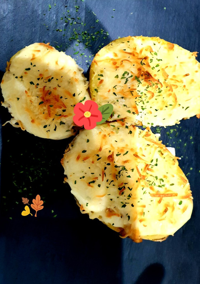 Una foto de Patatas rellenas de champiñones y bechamel