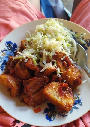 A picture of Masala potatoes and streamed cabbage.