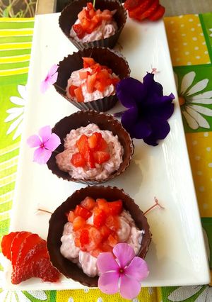 A picture of Strawberry cream in chocolate cups.