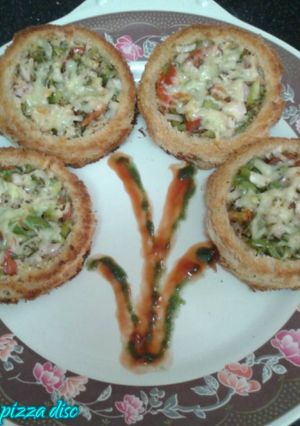 ब्रेड पिज्जा डिस्क (Bread Pizza Disc recipe in Hindi) रेसिपी मुख्य फोटो