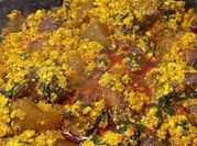 A picture of egusi and goat meat