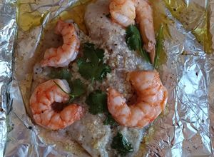 Una foto de Filete al parmesano con camarones en la freidora de aire