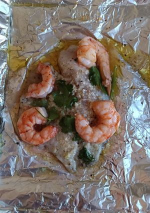 Una foto de Filete al parmesano con camarones en la freidora de aire