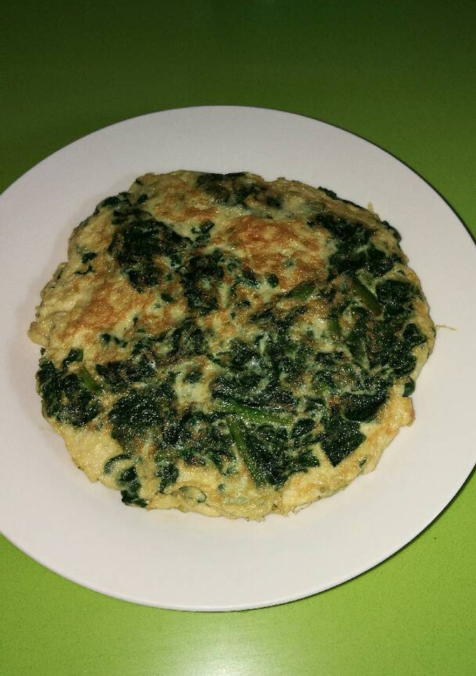 Una foto de Tortilla de espinacas con parmesano