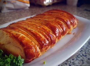 Foto principal de Hojaldre relleno de lomo, champiñones y queso de cabra