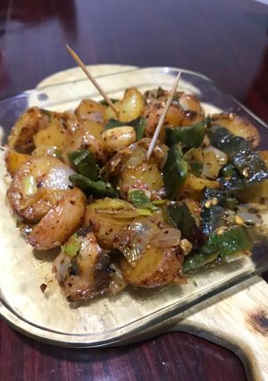 Una foto de Papas con chile cambray y poblano