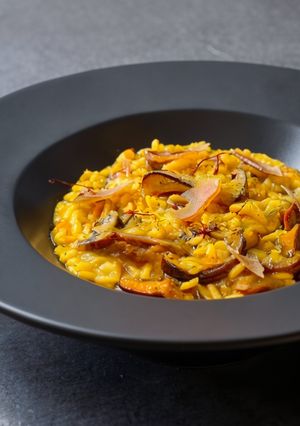 Foto di Risotto zafferano, funghi e bottarga