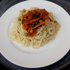 A picture of Spaghetti with veggies sauce.