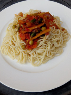 A picture of Spaghetti with veggies sauce.