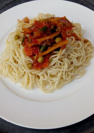 A picture of Spaghetti with veggies sauce.