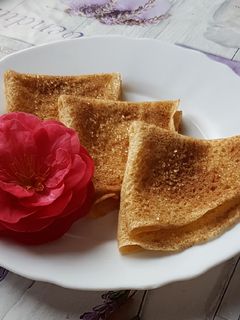 Una foto de Filloas con vino albariño