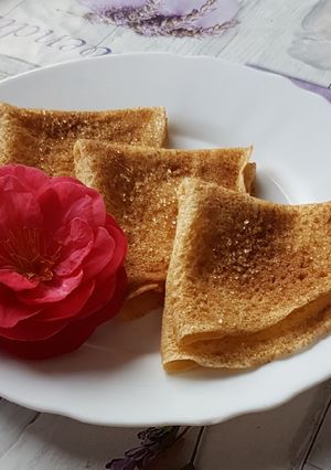 Una foto de Filloas con vino albariño