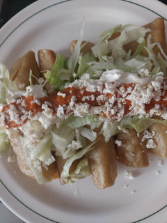 Una foto de Tacos dorados de Papa