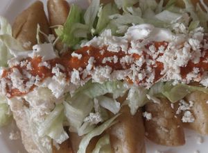Una foto de Tacos dorados de Papa