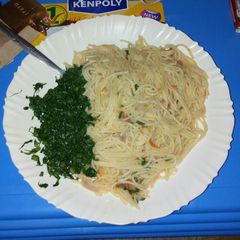 A picture of Spaghetti and sukuma wiki.