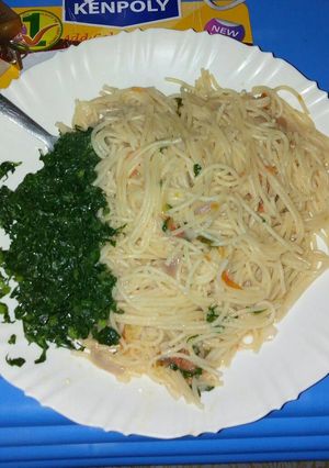 A picture of Spaghetti and sukuma wiki.