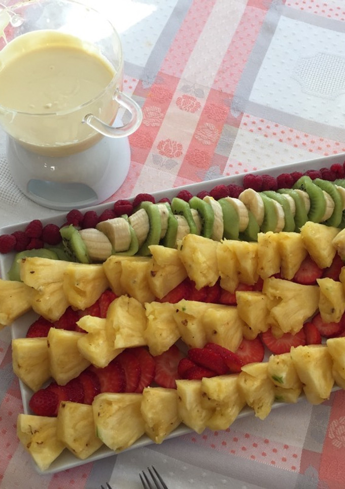 Una foto de Postre: fondue de chocolates con piña natural y otra fruta fresca