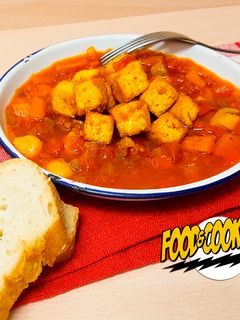 Una foto de Tofu con Tomate