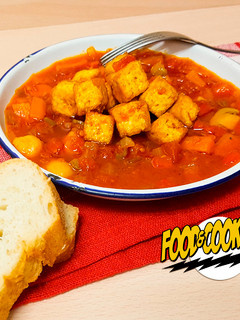 Una foto de Tofu con Tomate