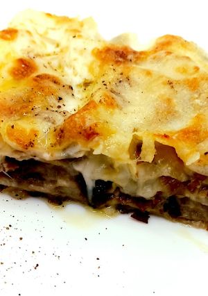 A picture of Lasagna with Radicchio and Speck.