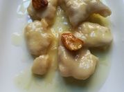 Una foto de cocochas al pil pil