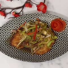 A picture of Roasted fish with leek, ginger and chilli 🐠 🌶.