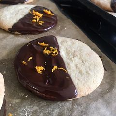 A picture of Chocolate Dipped Orange & Cardamom Biscuits 🍊.
