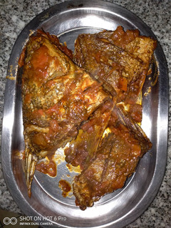 A picture of Fried fish with tomatoes gravy#staplefoodrecipecontest.