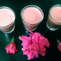 A picture of Hibiscus green tea with coconut milk.