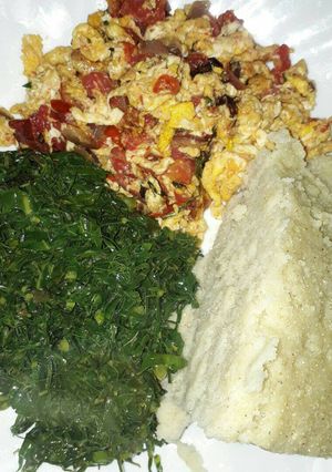 A picture of Eggs and kales.