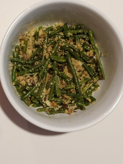 Foto di Cous cous con sgombro, fagiolini, uvetta e cipollotto