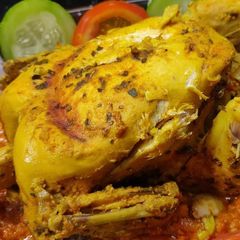 A picture of Stuffed Whole Chicken without Oven.