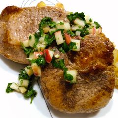 Allspice pork chops with apple chimichurri A picture of Allspice pork chops with apple chimichurri.